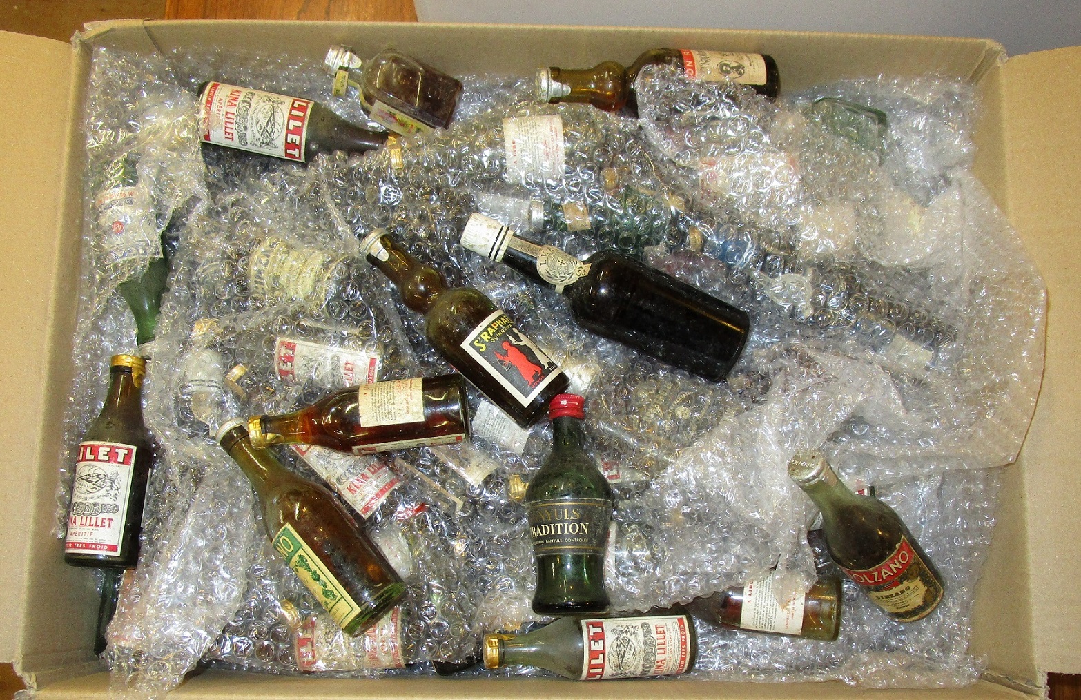 a commodity of xxx bottles alcoholic beverages like port/ wines and spirits. (28372)